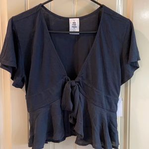 Black Ruffled Top by We The Free Brand.